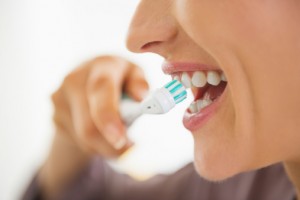 Girl brushing her teeth