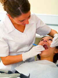 Dentist checking the patient