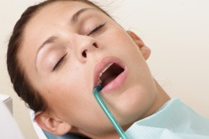 Female patient at the dentist having local anesthesia