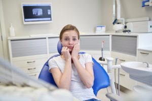 Young girl in dentist clinic